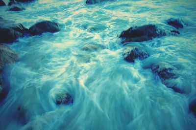 Waves splashing on rocks