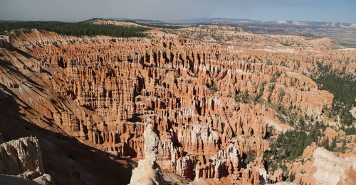 Panoramic view of landscape with mountain range in background