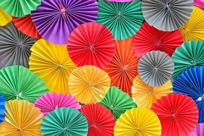 Full frame shot of multi colored umbrellas at market