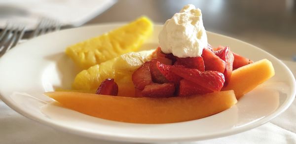 Close-up of breakfast served on table