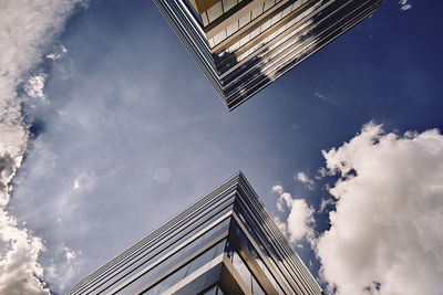 Low angle view of modern buildings against sky