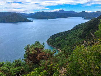 High angle view of bay against mountains