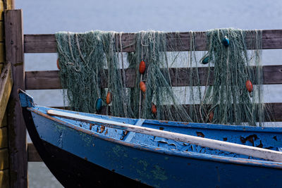 Fishing boat moored at sea shore