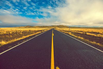 Road against sky during sunset