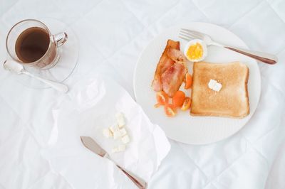 High angle view of coffee served on table