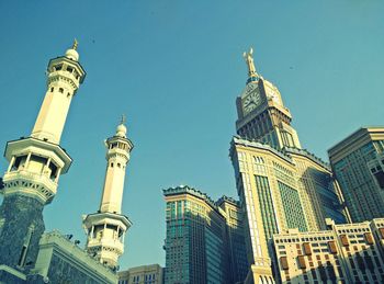 Low angle view of masjid al-haram against clear sky