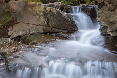 Scenic view of waterfall on a cold winter day. 