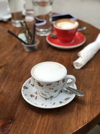 High angle view of coffee cup on table