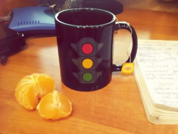 Close-up of coffee cup on table