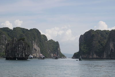 Panoramic view of bay against sky