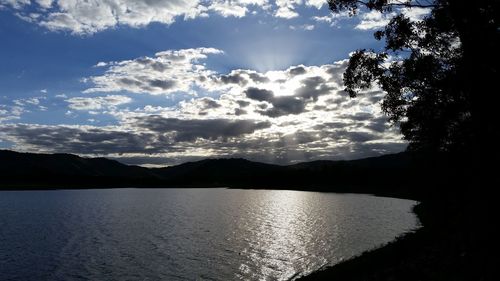 Scenic view of mountains against sky at sunset