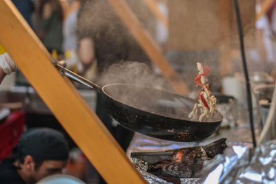 Cropped hand man preparing food