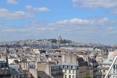 Buildings against sky