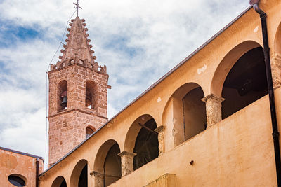 Low angle view of historic building against sky