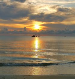 Scenic view of sunset over sea