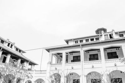 Low angle view of buildings against clear sky