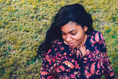 Young woman looking away outdoors