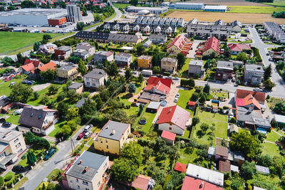 High angle view of houses and buildings in city