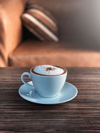 Coffee cup on table