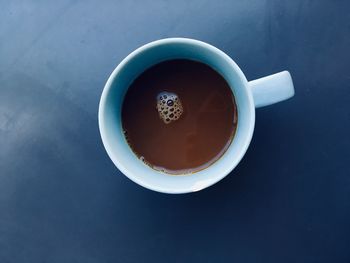 High angle view of coffee cup on table