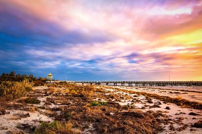 Scenic view of sea against cloudy sky