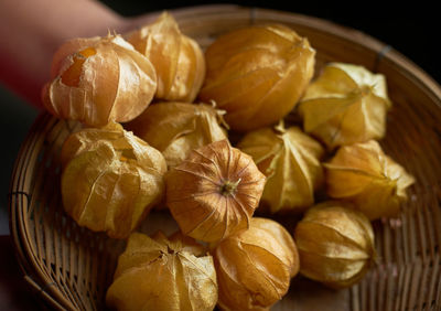 High angle view of fruits in basket on table