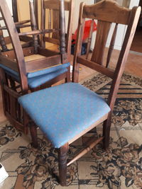 High angle view of chairs on table at home