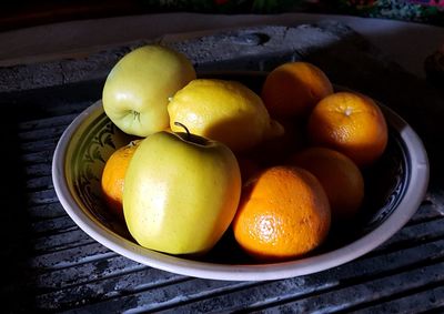 High angle view of fruits in container on table