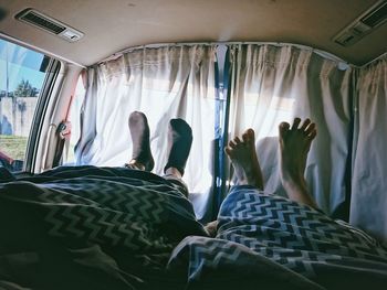 Low section of people in camper van