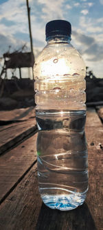 Close-up of water bottle on table