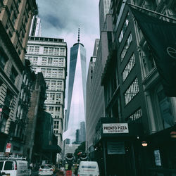 Panoramic view of city street against sky