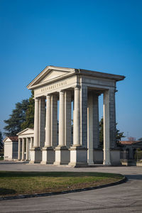 Low angle view of historical building against blue sky