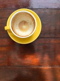 Close-up of cappuccino on table