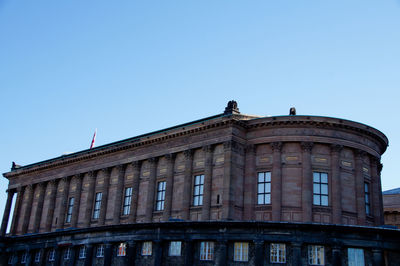 Low angle view of building against clear sky