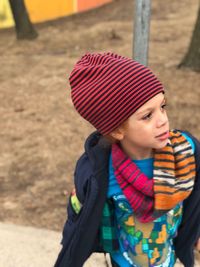 Close-up of boy wearing hat