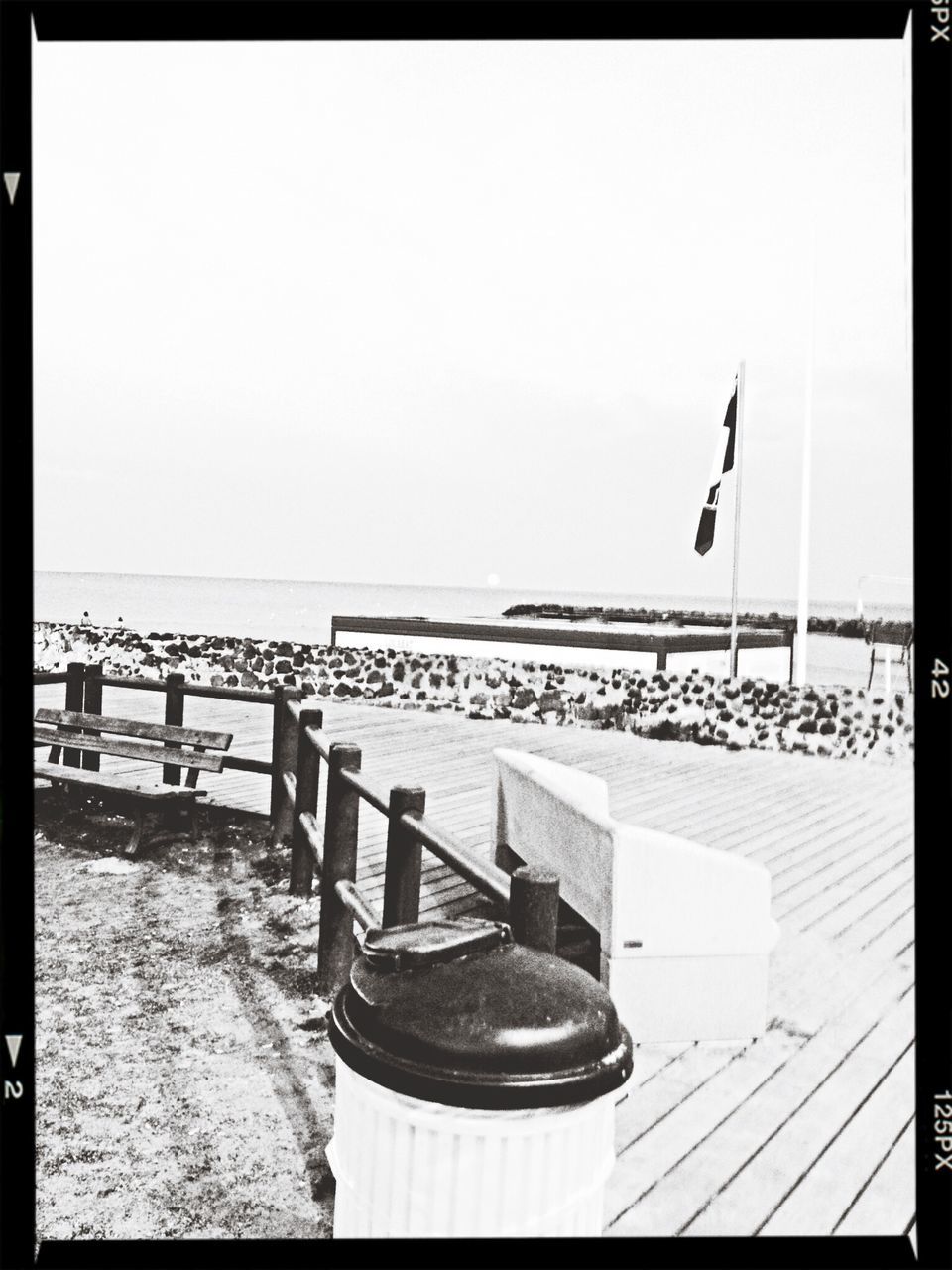 transfer print, auto post production filter, sea, clear sky, water, horizon over water, railing, tranquility, copy space, beach, tranquil scene, sky, nature, scenics, outdoors, day, shore, empty, beauty in nature, absence