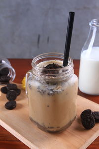 Close-up of glass of jar on table