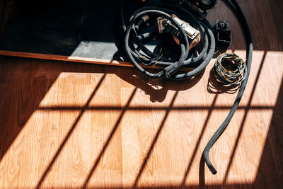 High angle view of camera on hardwood floor