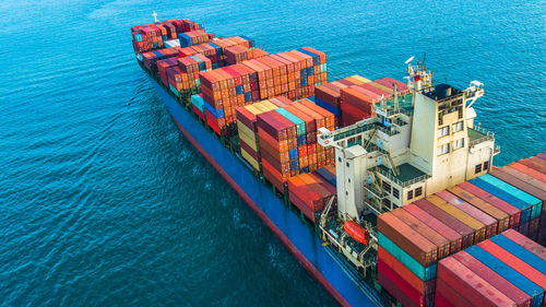 High angle view of container ship at commercial dock