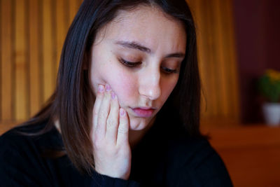 Young woman with toothache. tooth pain concept.