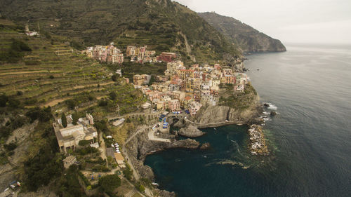 High angle view of buildings on sea