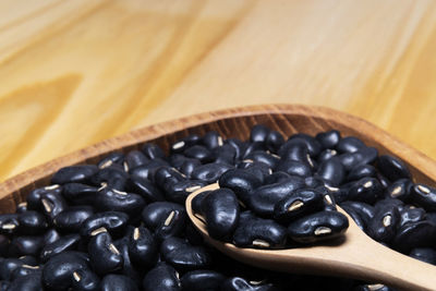 Close-up of coffee beans on table