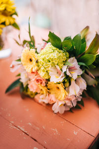 Close-up of white rose on table