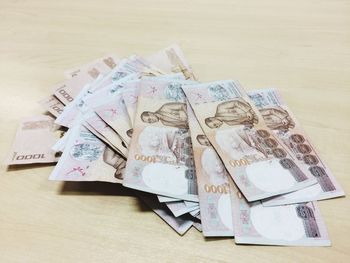 Close-up of coins on table