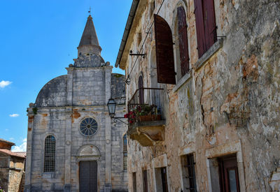 Low angle view of old building against sky