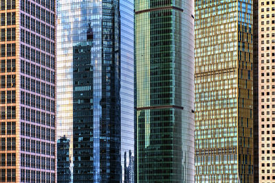 Low angle view of modern buildings in city