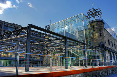 Low angle view of modern building against sky