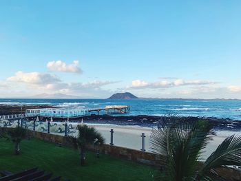 Scenic view of sea against blue sky