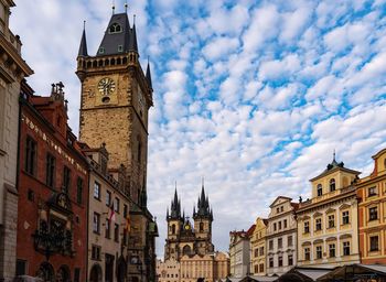 Low angle view of old town buildings in prague against sky