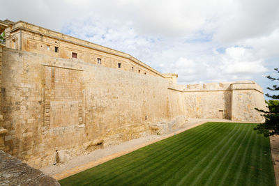These gardens surround the medieval city of mdina. fortress wall and howard gardens of mdina citadel